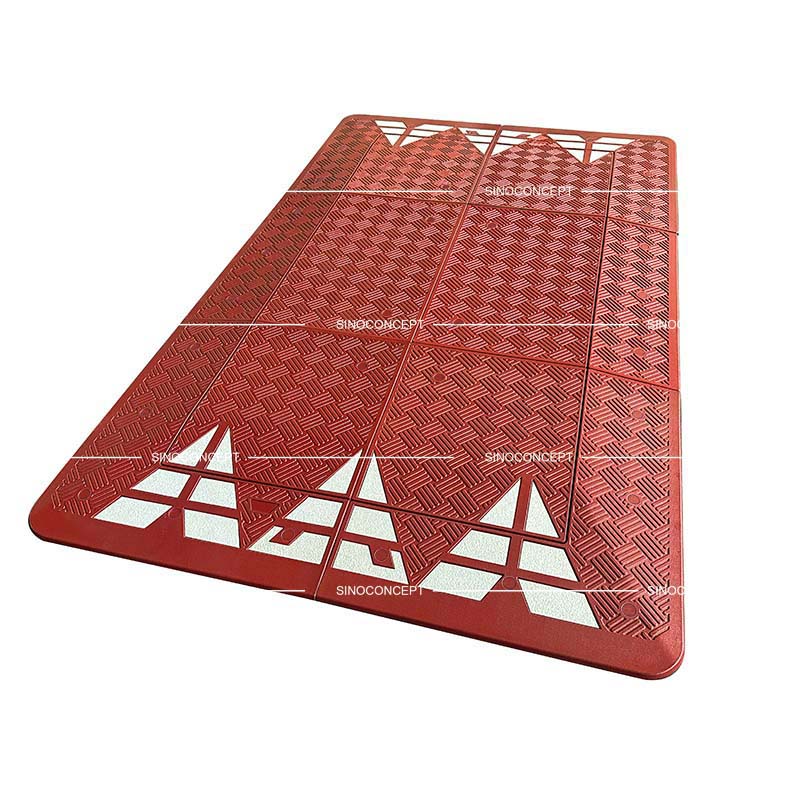 A red 6-part Europe style speed cushion made of Plastic-Rubber composite for traffic-calming purposes.