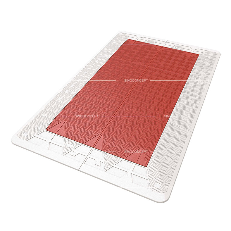 A red and white 6-part Belgium style speed cushion made of Plastic-Rubber composite for traffic-calming purposes.