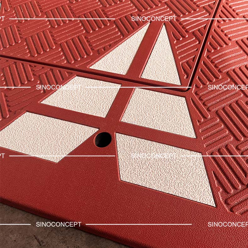 Red speed table with anti-slipe stripes design on the surface and white reflective films used as traffic calming devices