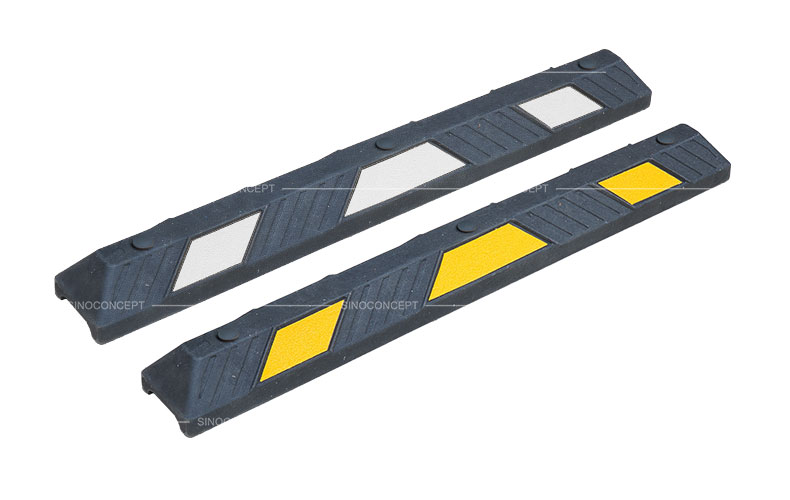 Two 1220mm black parking blocks made of Plastic-Rubber composite with white or yellow glass bead reflective tapes for car park management.