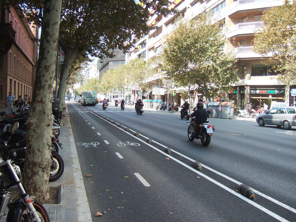 Armadillo lane dividers and white road markings to separate cycle lanes and motor vehicle lanes