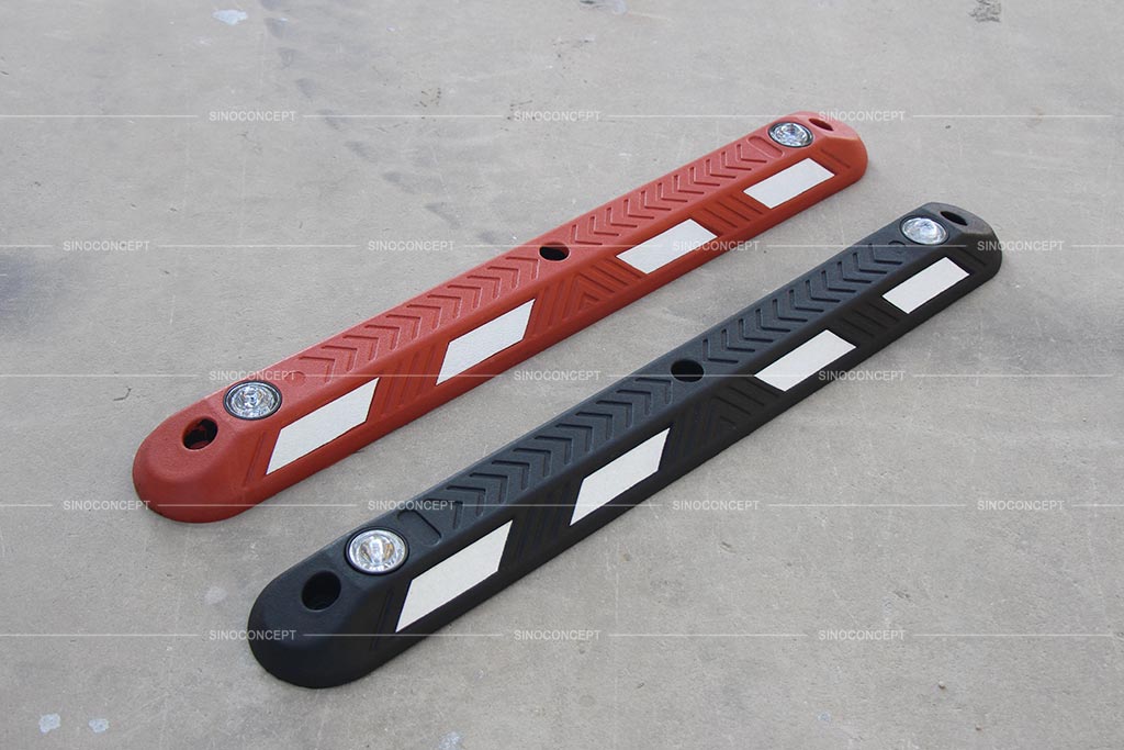 Black and red cycle lane dividers manufactured in Sino Concept factory with recycled rubber for traffic management purposes