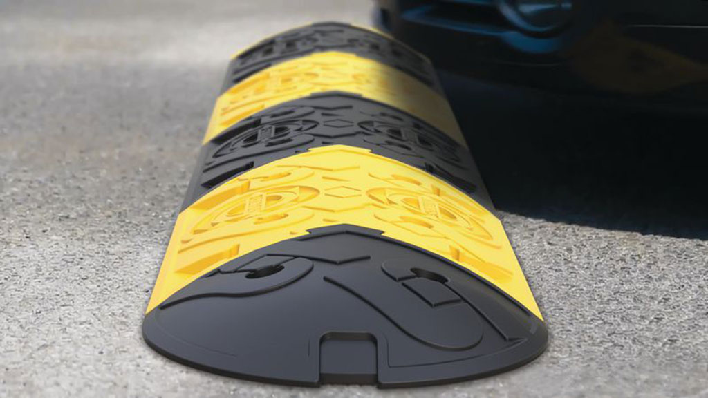 Black and yellow speed bump with special design anti-slip surface