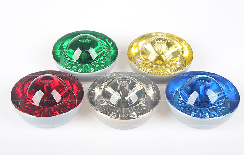 Big size glass reflective road studs of different colours also called road color studs used on roads as road safety equipment