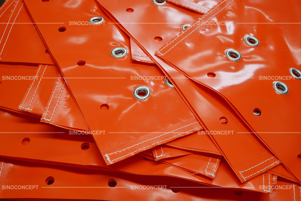 A lot of orange sandbags are manufactured by Sino Concept with high quality