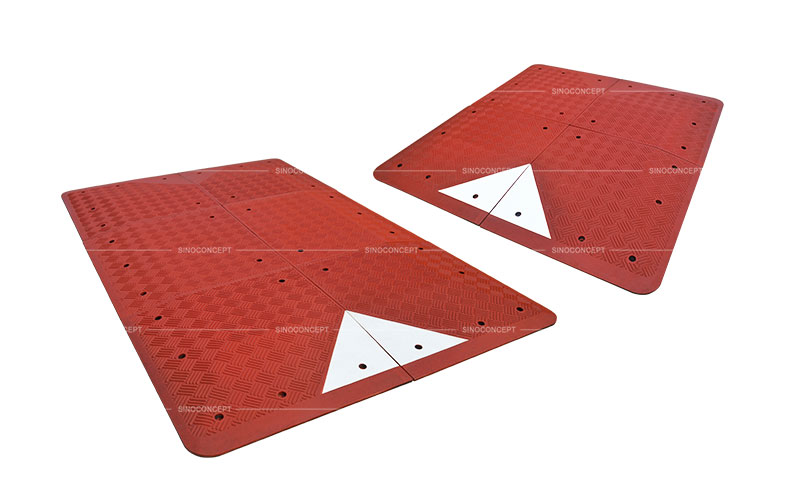 Red speed cushion also called speed table with 4 parts made of red vulcanized rubber and white reflective tapes