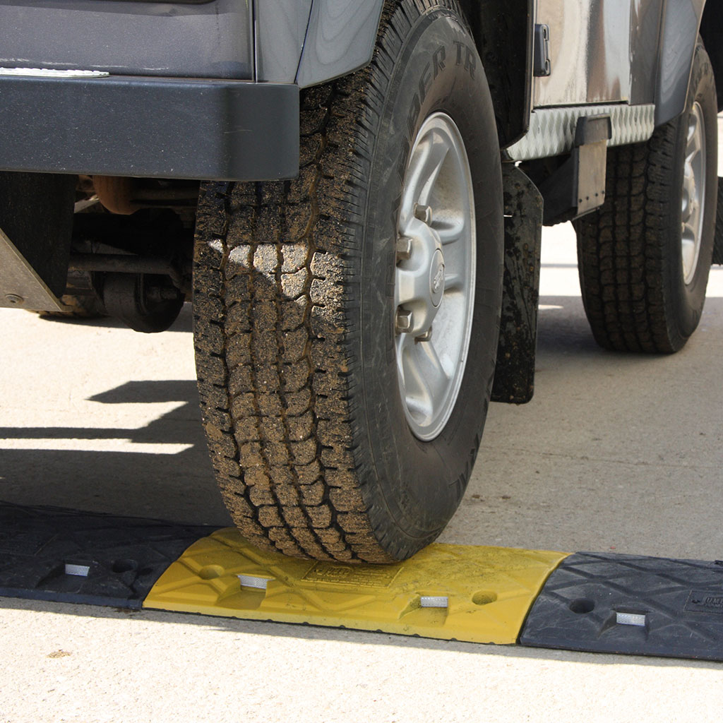 Black and yellow speed ramp made by JSP for better traffic management