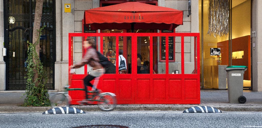 Black cycle lane separators with white stripes design to make safe lanes for cyclists