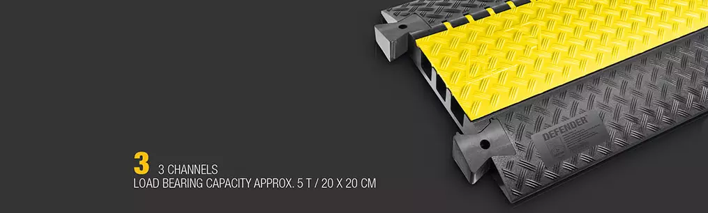 Black and yellow cable ramp made by Defender includes a 3-channel cable protection system.