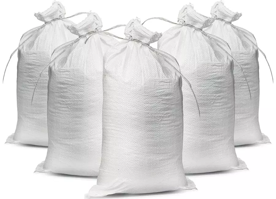 Five white sandbags are made from polypropylene, a lasting and dependable material.
