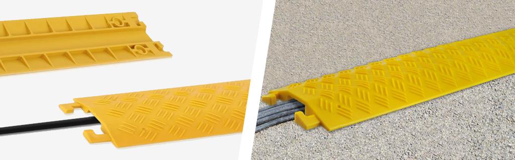 Yellow drop-over cable protectors are made of polyurethane and designed with a skidproof surface.
