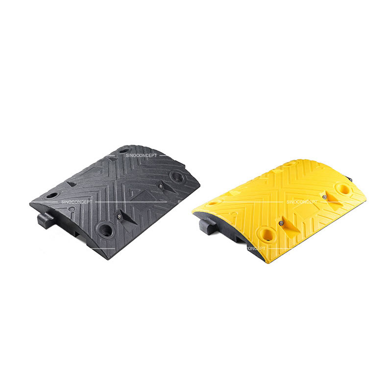 A black and a yellow middle parts of a 7cm high Plastic-Rubber composite car speed bump.
