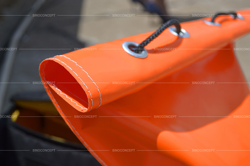 Orange sandbag made of PVC by Sino Concept with a durable black string