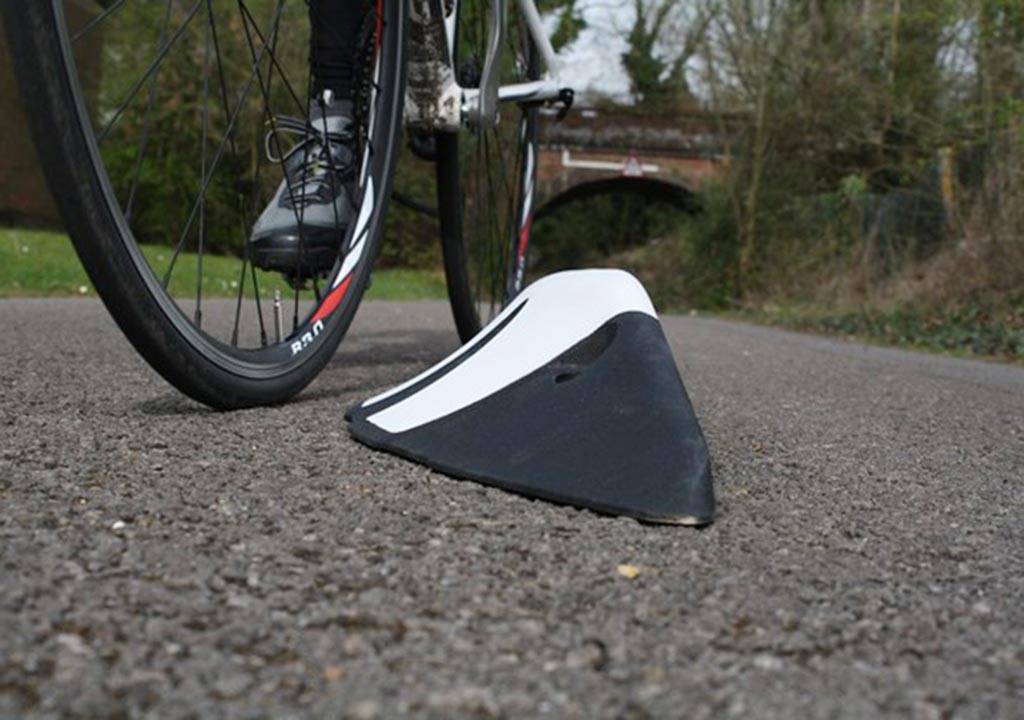 ORCA lane separator coloured in black and white to ensure cyclists' security on the road