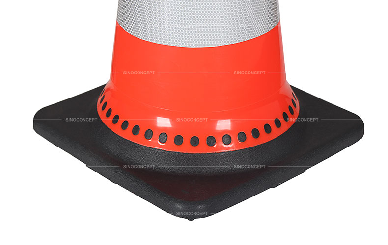 Orange road cone made of PVC material with glass bead reflective tapes, connected with a weighted black rubber base