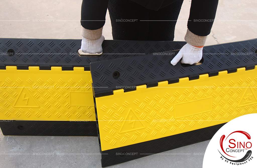 5-channel rubber cable ramps made of rubber, also called cable protectors, are designed with anti-slip surfaces and yellow plastic lids.