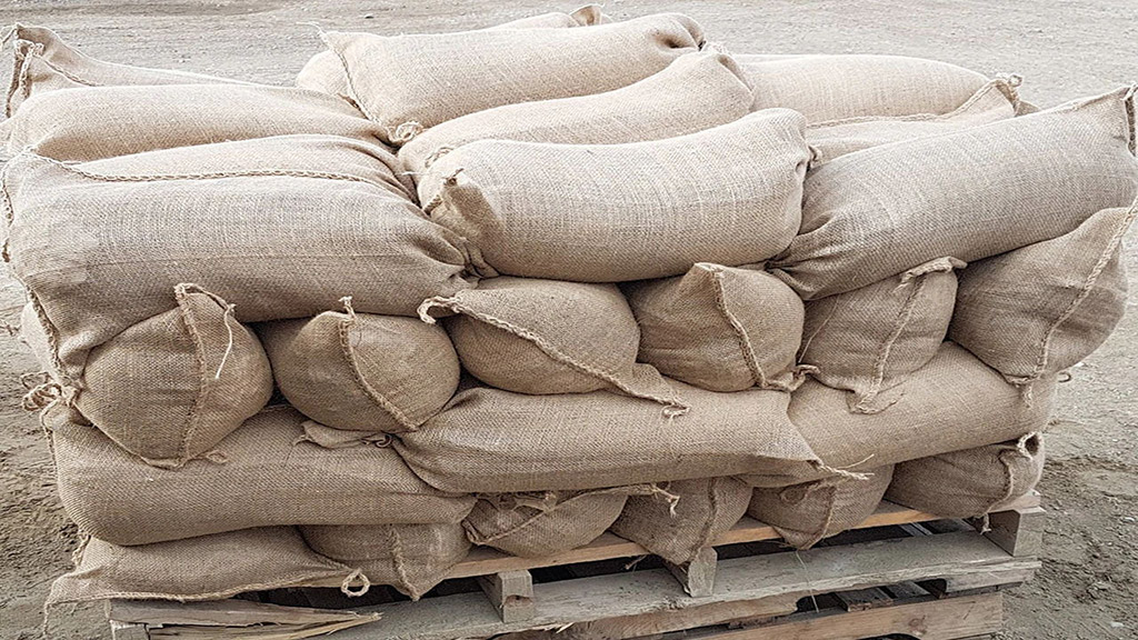 Many sandbags are put together for flood preventing function