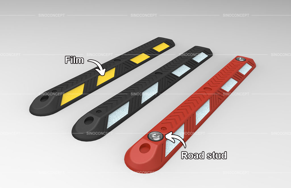 Black lane separators with yellow or white reflective films, and a red lane separator with white reflective films and road studs