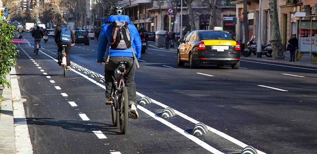 Zebra cycle lane separators installed on the road to separate cycle lanes from motor vehicle lanes