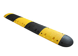 Traffic rubber speed bump of 7cm height made of yellow and black recycled rubber as a traffic calming device