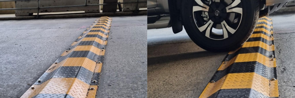 Steel speed bump also called speed ramp coloured in black and yellow, used for car park management