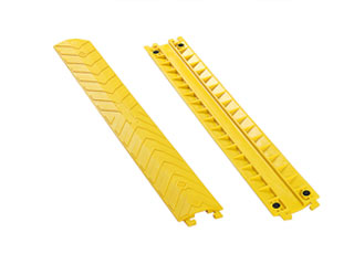 Small size yellow drop over cable protector made of polyurethane also called drop over cable ramps used to protect cables