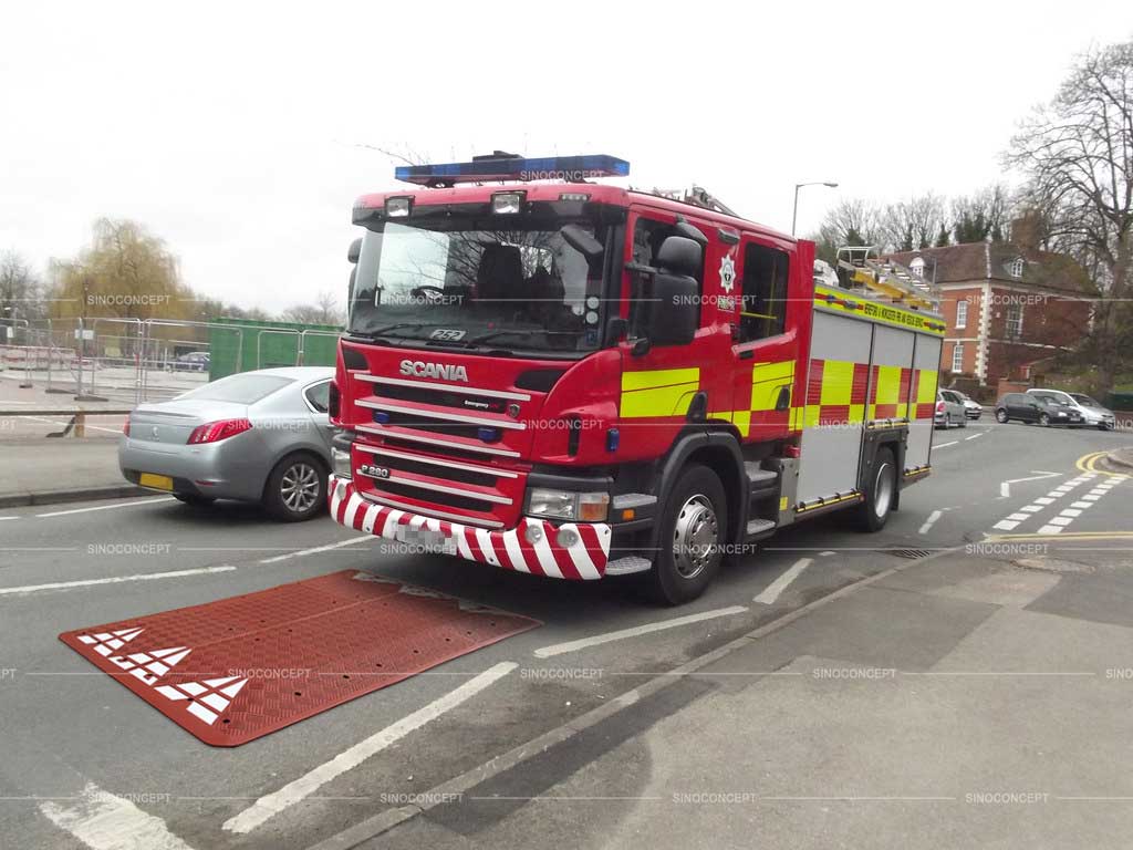 A fire fighting truck can pass over the rubber speed cushion easily