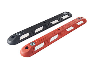 Black and red lane separators made of recycled rubber with or without reflective glass road studs, used for traffic safety management