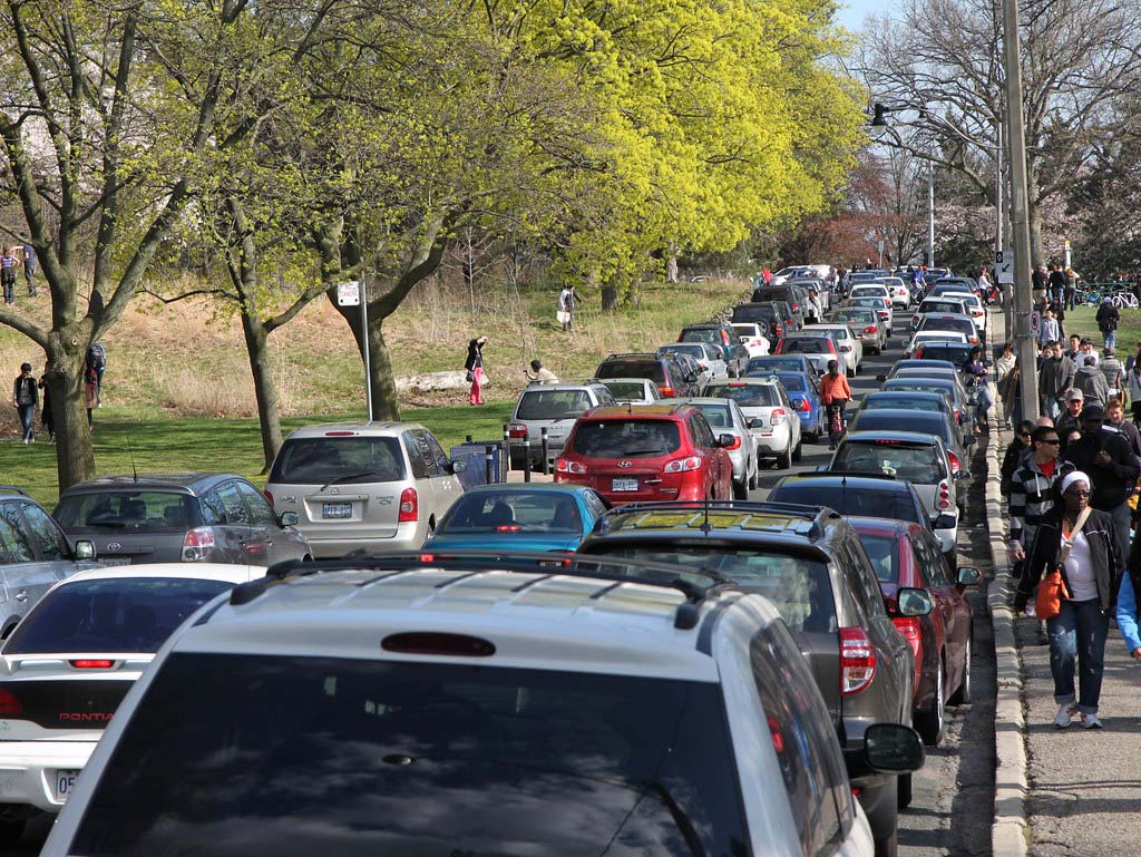 Crowded traffic and parking situation on roads