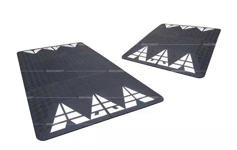 Europe black rubber speed cushions with white markings, manufactured by Sino Concept.