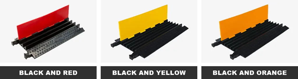 Three cable ramps with black bases, one with a red lid, one with a yellow lid and one with an orange lid.
