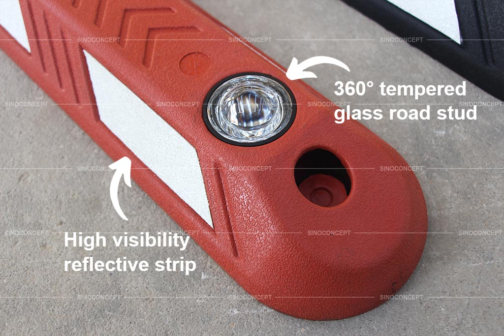 High quality rubber lane divider coloured in red, designed with embedded road studs and high visibility reflective strips