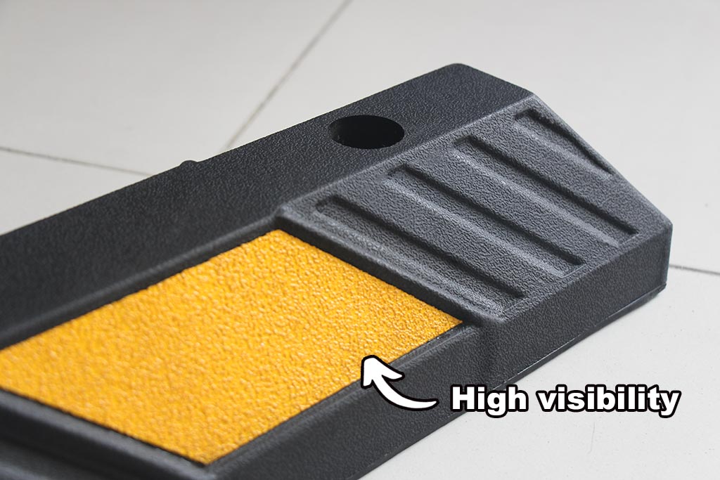 Yellow reflective film pasted on the rubber wheel stop is with high visibility for traffic safety