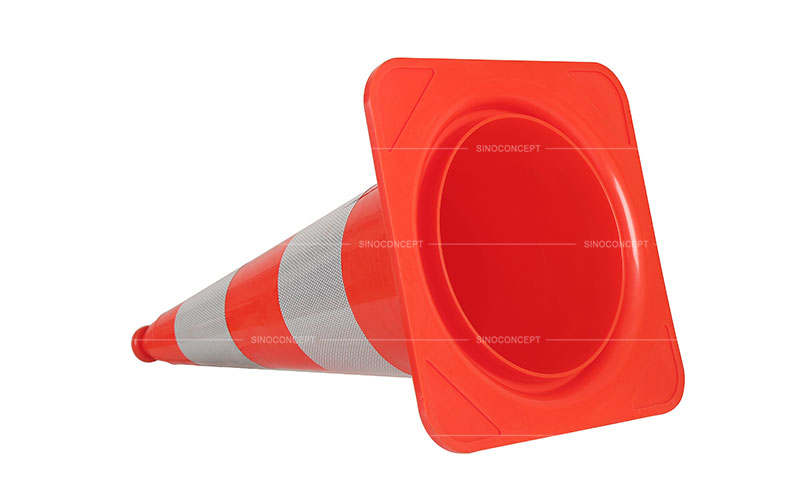 Bottom view of the orange traffic cones pasted with glass bead reflective tapes used as highway traffic management equipment