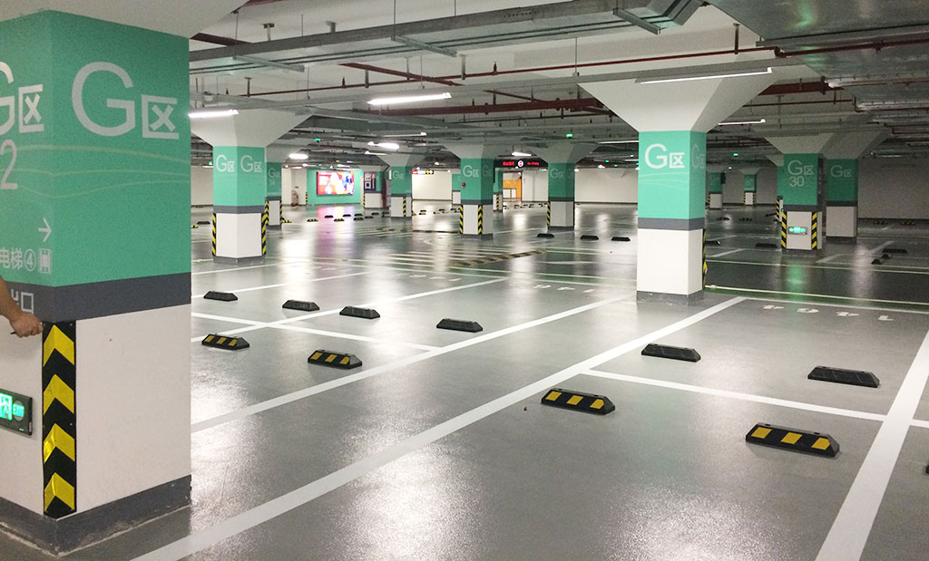 Many parking stoppers are installed in an inside parking lot for better parking management