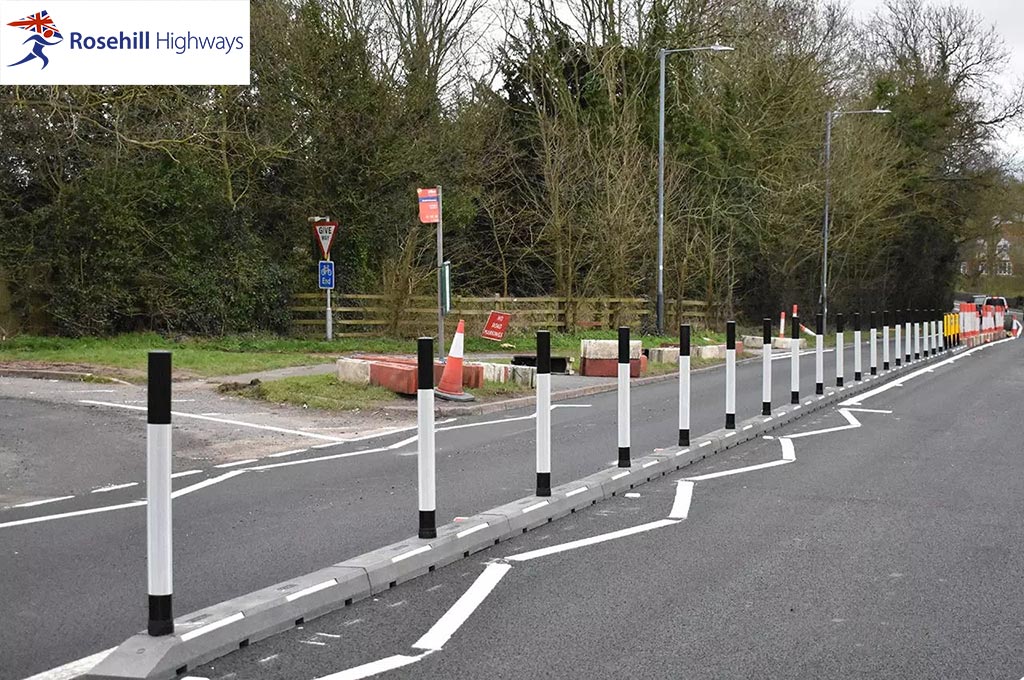 Cycle lane separators with posts inserted on the base, used for the security of road users