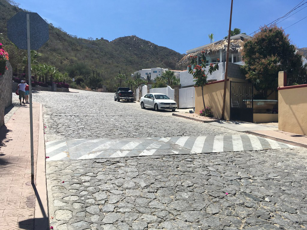 An old road hump installed across the road to calm traffic