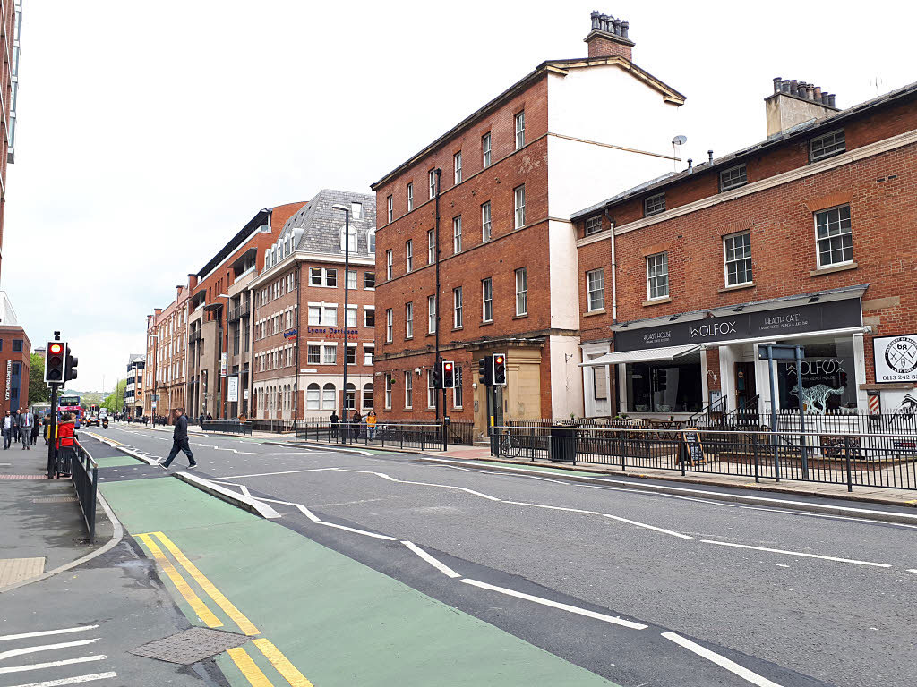 Lane dividers and road markings on the road to separate a cycle lane for bicyclists