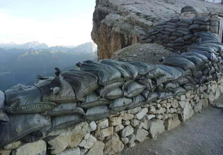 Sandbag barricades alongside the mountain's edge are made of woven polypropylene.