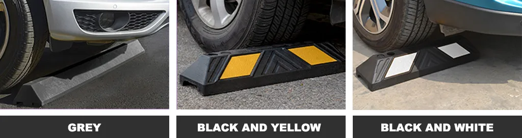 Grey, black and yellow, black and white wheel stops for parking management.