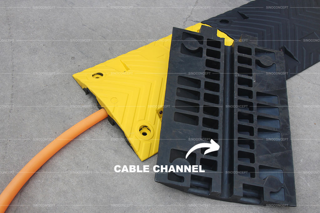 Rubber speed bumps designed with trannels to cover hoses