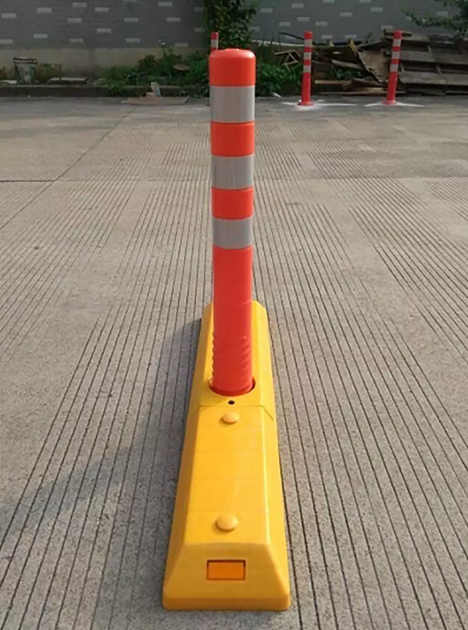 Several lightweight and easy-to-install plastic lane dividers are mounted on the ground