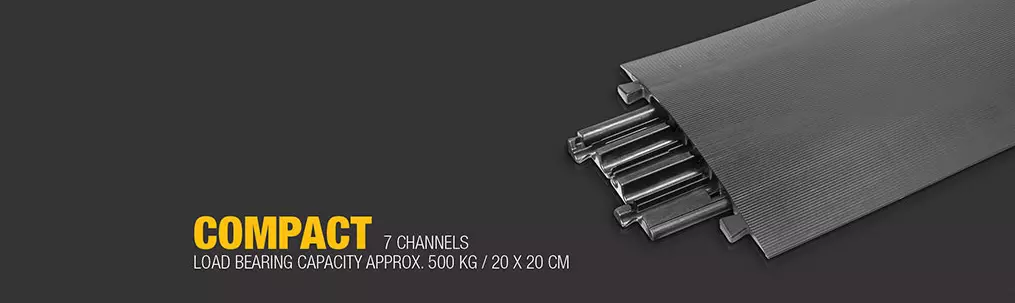 Black 7-channel Defender COMPACT series cable ramp.