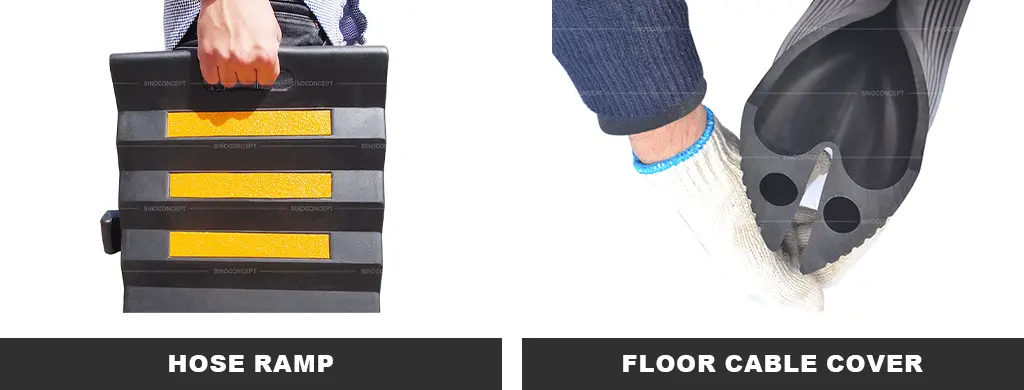 A black hose ramp with yellow reflective films and a black rubber floor cable cover used as cable management tools.