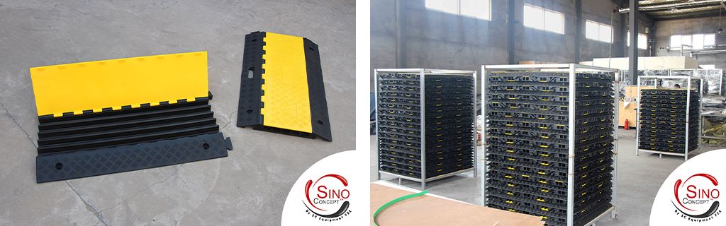 A lot of rubber cable ramps are packed in iron racks.