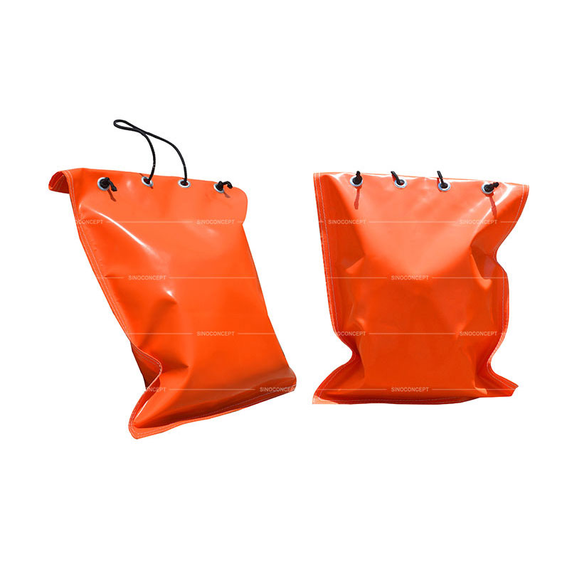 PVC orange sandbags with eight aluminium eyelets to guarantee corrosion resistance for traffic control