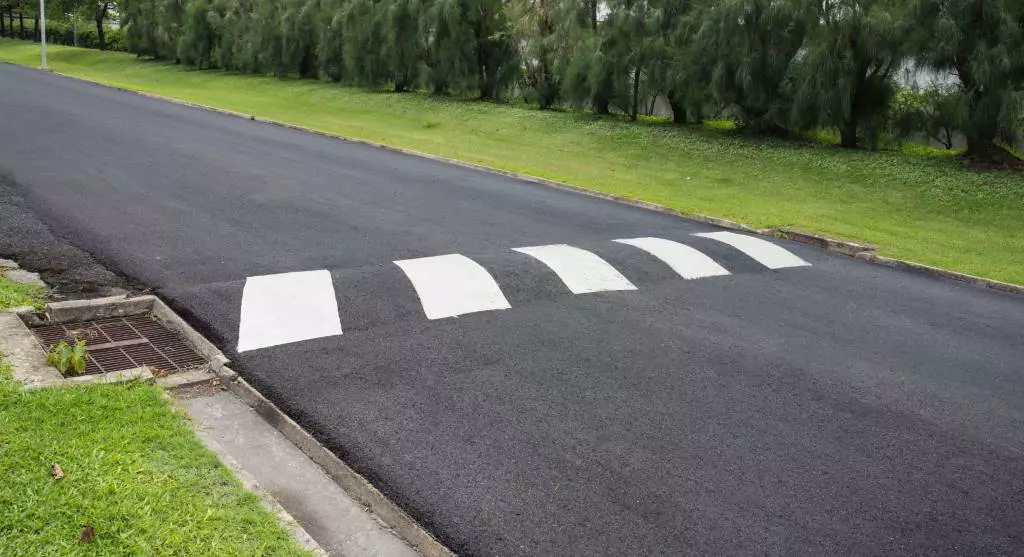 Asphalt speed hump made on road to calm traffic