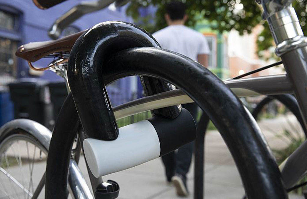 A bicycle lock is securing the bicycle.