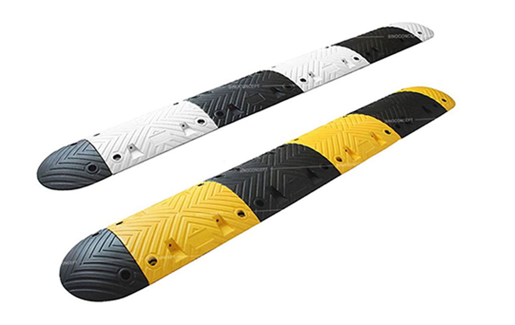 A black and white, and a black and yellow speed bump.