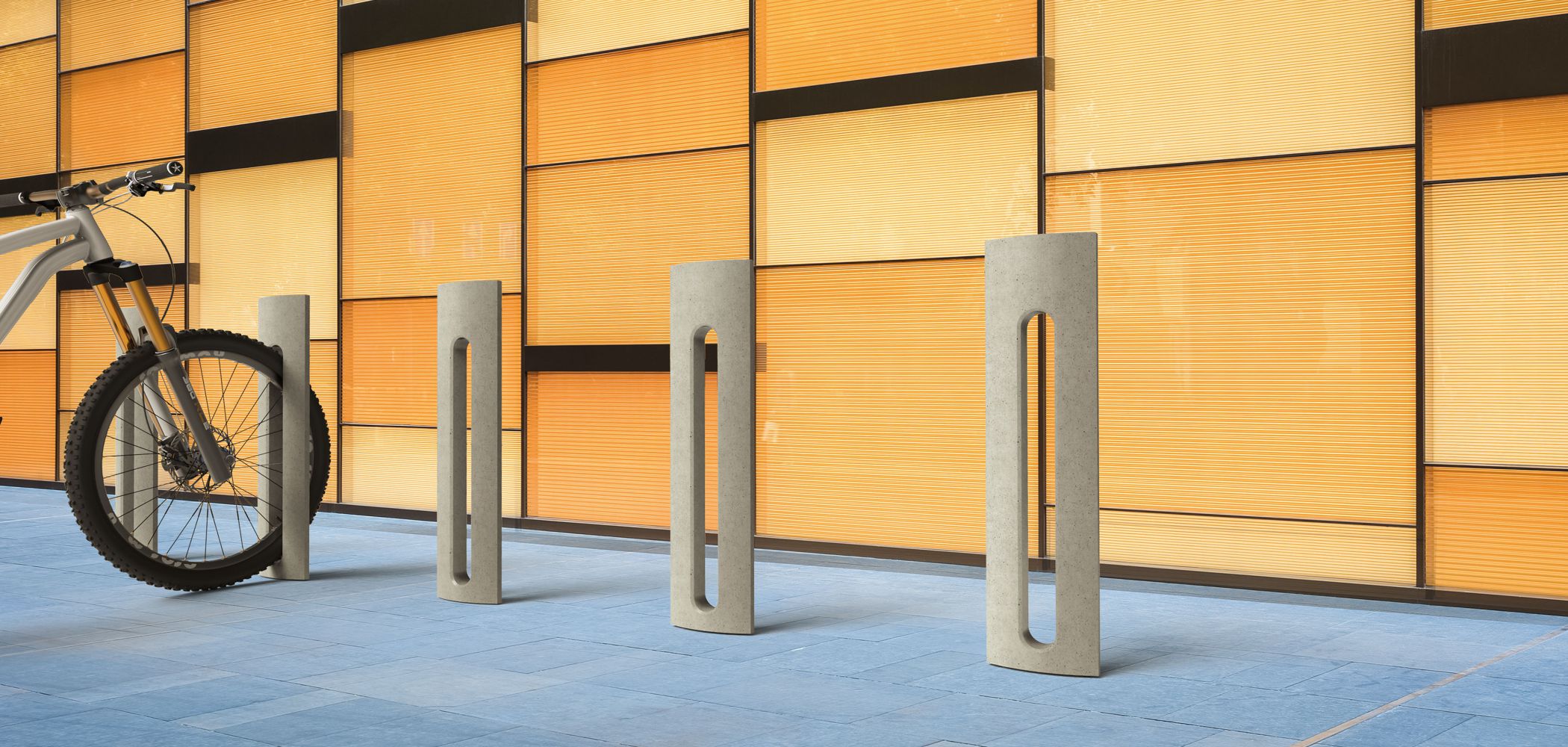 Bollard style bike racks used to secure a bike wheel.